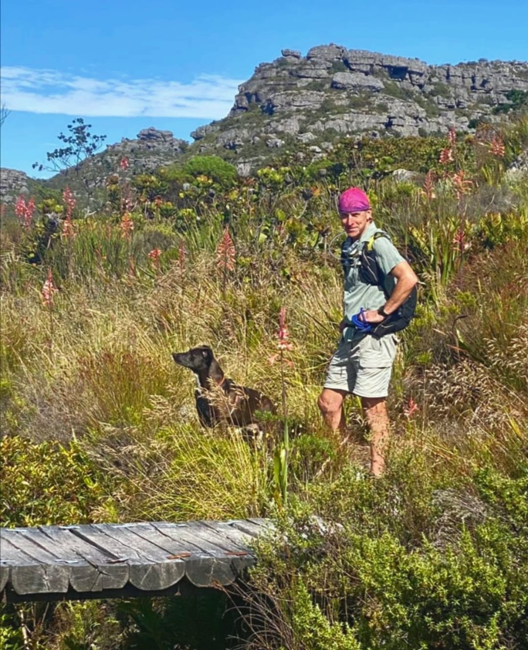 Guy with his hound, Tessa, on the mountain